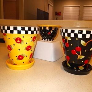 Mary Engelbreit 2 small plant pots and votive holder.